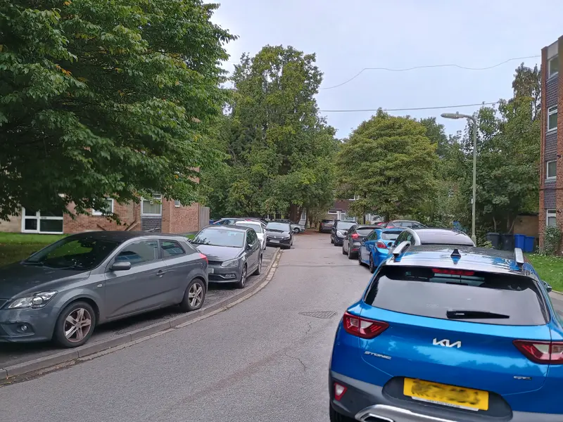 Vehicles parked on pavement